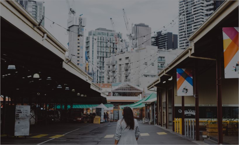 Woman walking at Queen Victoria Market