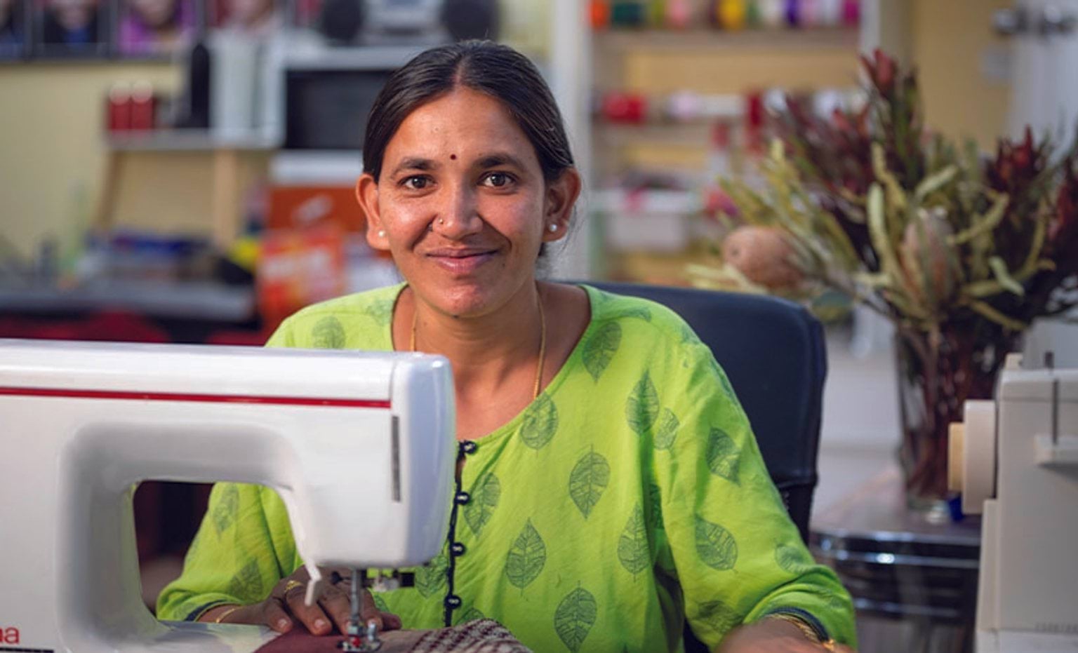 Paw Po Products female staff member sewing