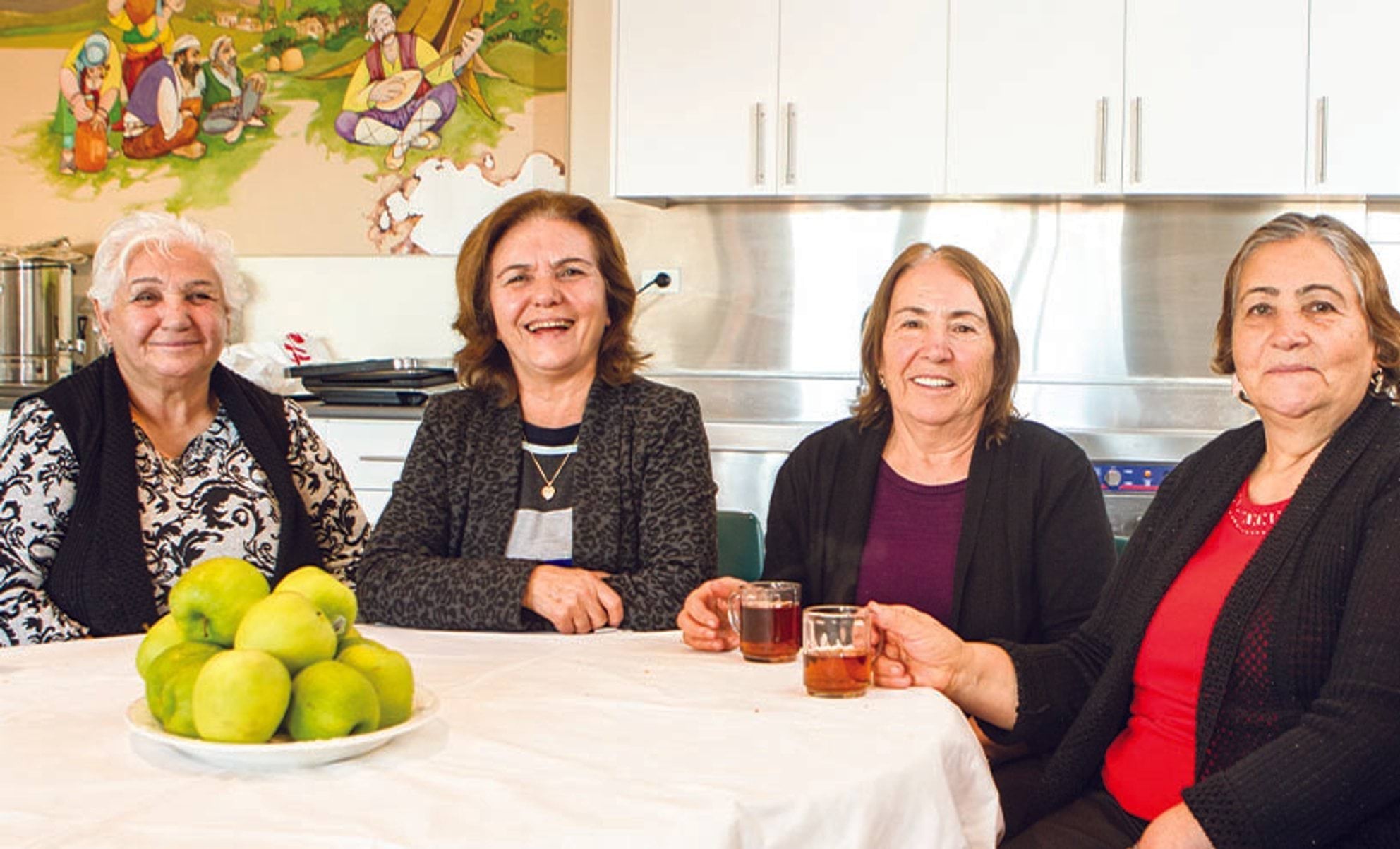 Greek women having lunch at a community centre Greek women having lunch at a community centre