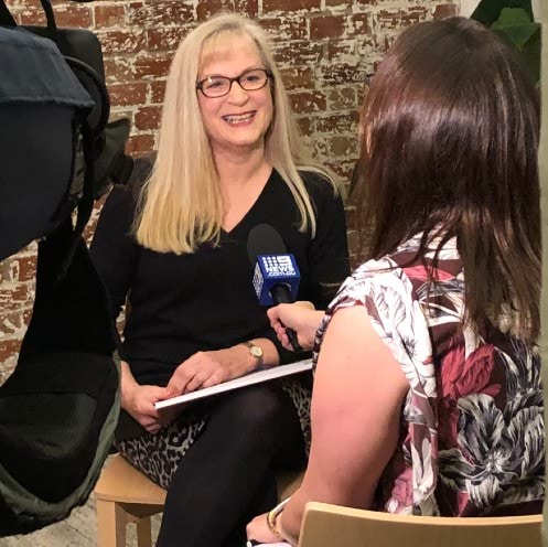 Victim Survivors' Advisory Council Chair Jennifer Jackson giving a media interview