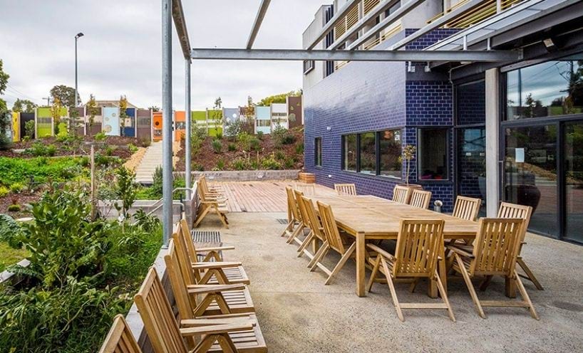 Outdoor communal seating area with wooden setting