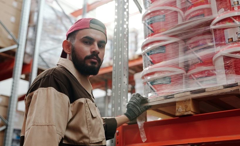 portrait of a male worker in a warehouse