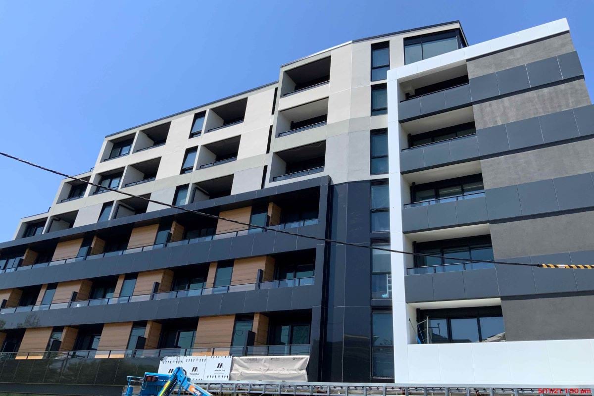 A building set against a blue sky. 