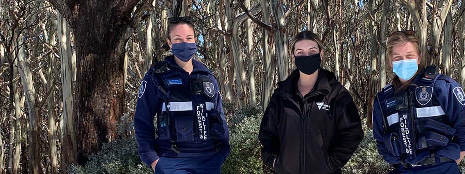 Image of wildlife officers standing together smiling