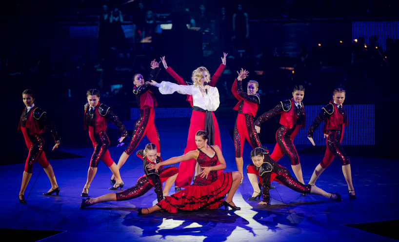 Large group of dancers perform their finale