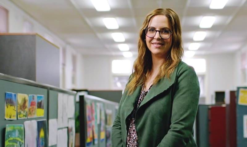 A smiling senior disability justice coordinator