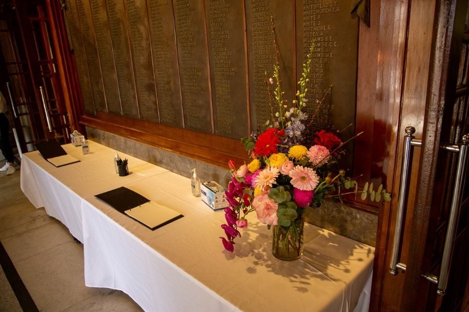 Condolence books at the entrance of the service.