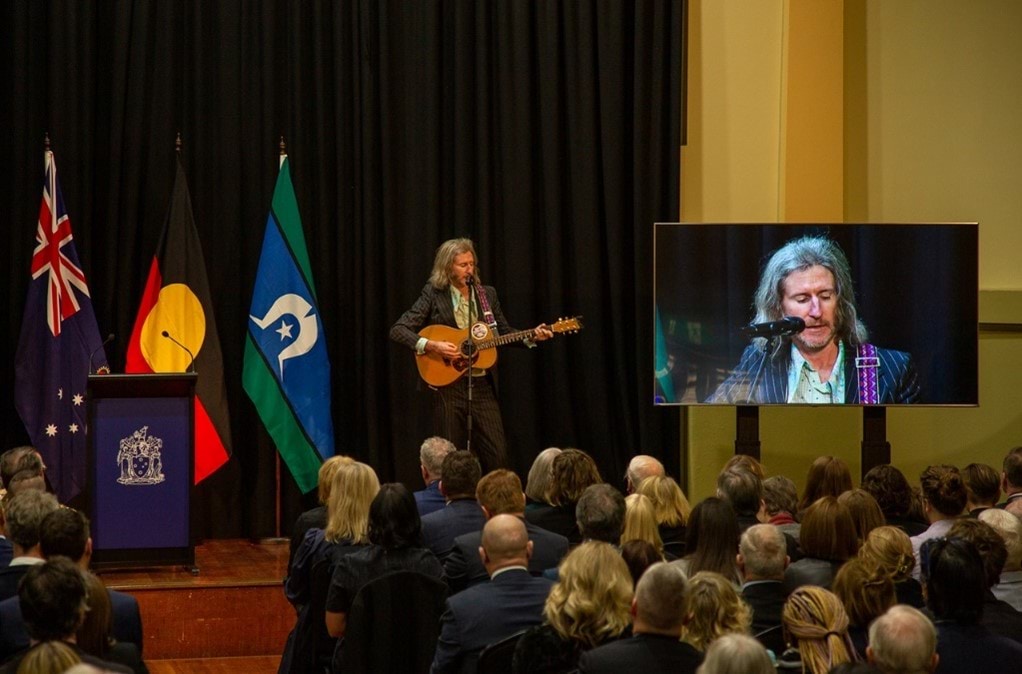 Mr Tim Rogers singing a musical tribute to honour the life of Ms Garrett.