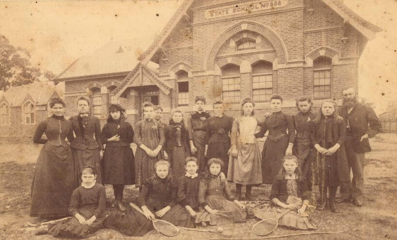 Black and white photograph of students in front of the Camberwell Primary School