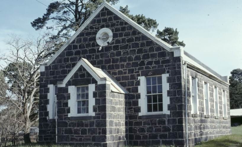 Photograph of the bluestone school building at Mernda Primary School