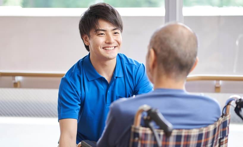 Disability aged carer assisting client