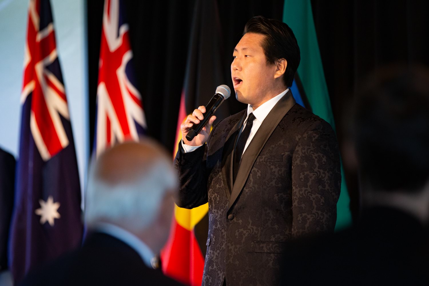 Mr Raphael Wong performing the Australian National Anthem