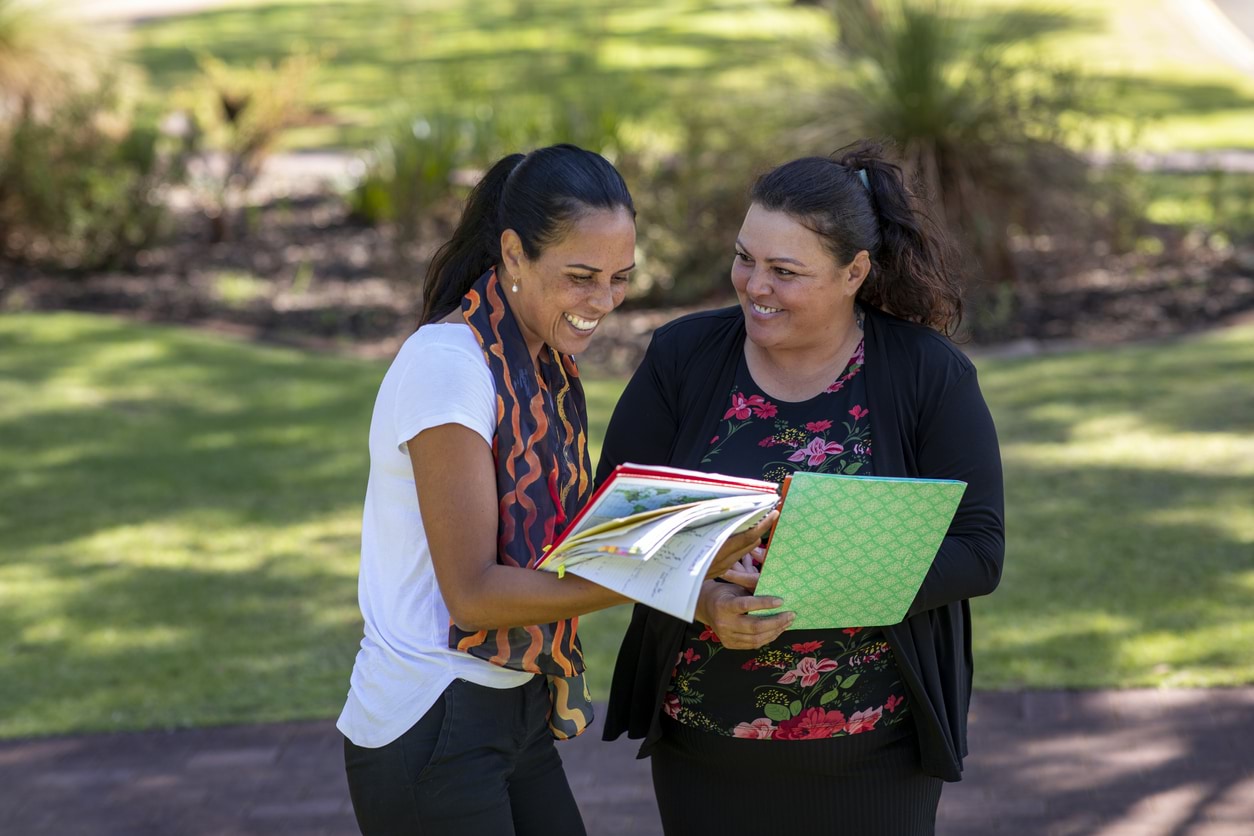 two teachers speaking