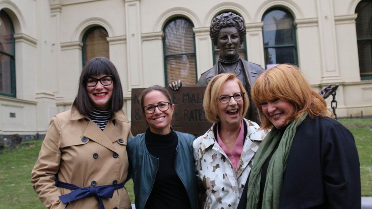 A Monument of One's Own co-conveners Kristine Ziwica and Professor Clare Wright, former Prime Minister Julia Gillard and sculptor Jennifer Mann posing together in front of the statue, a moment after the unveiling.