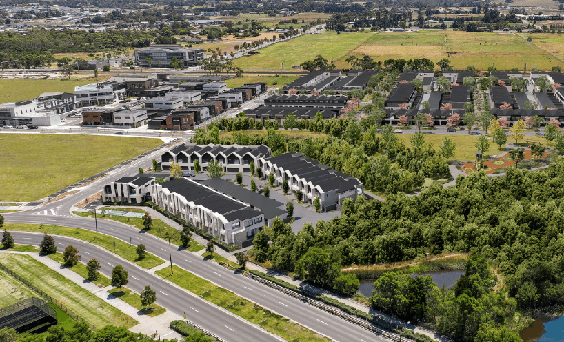 Aerial suburb shot showing apartments, housing and parkland