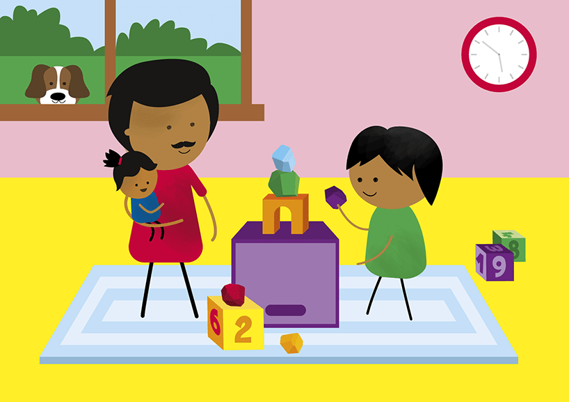 Illustration of a family inside playing with the Kinder Kits balancing gems. There is a child on a mat balancing gems on top of a box. An adult male holding a baby is watching as the child places the third gem on the tower.