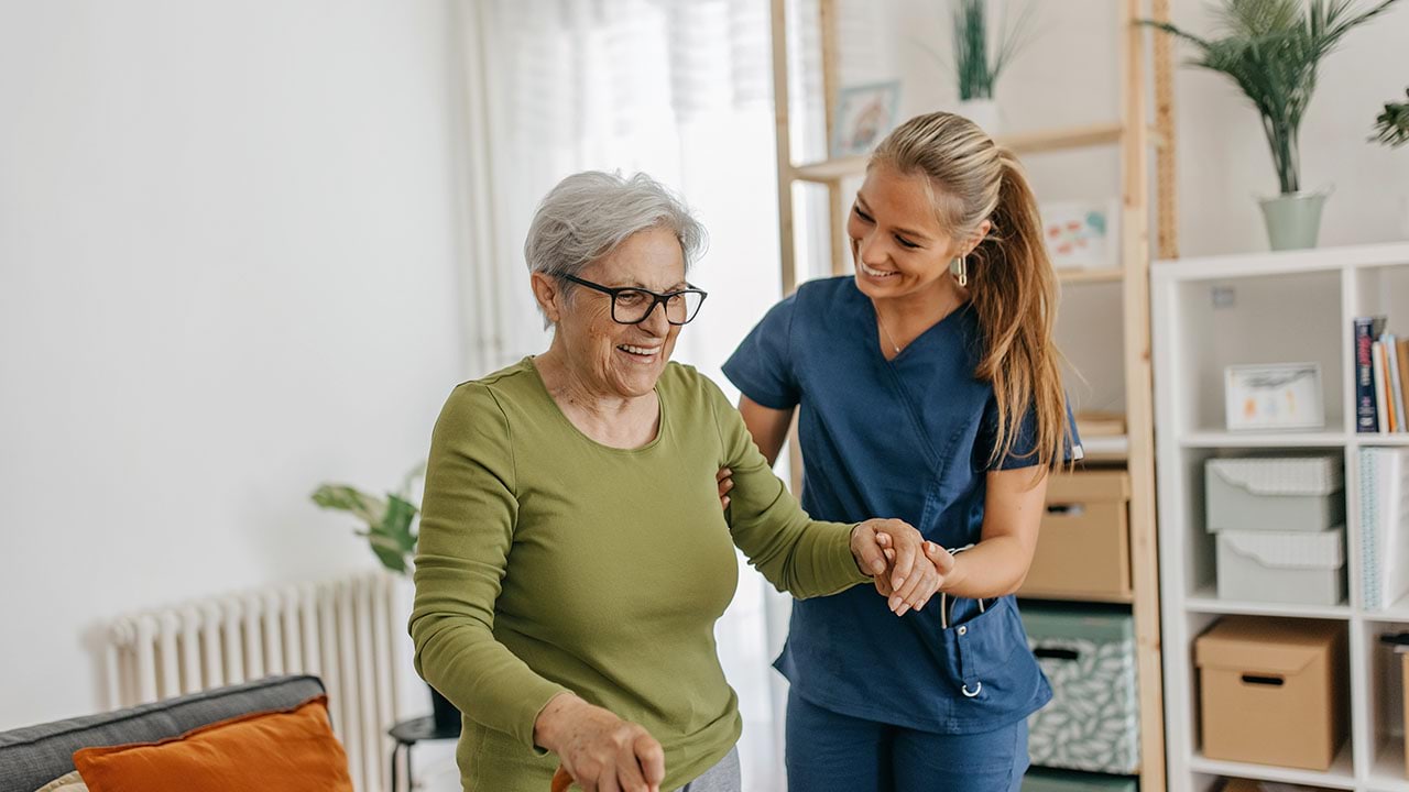 Carer assisting patient