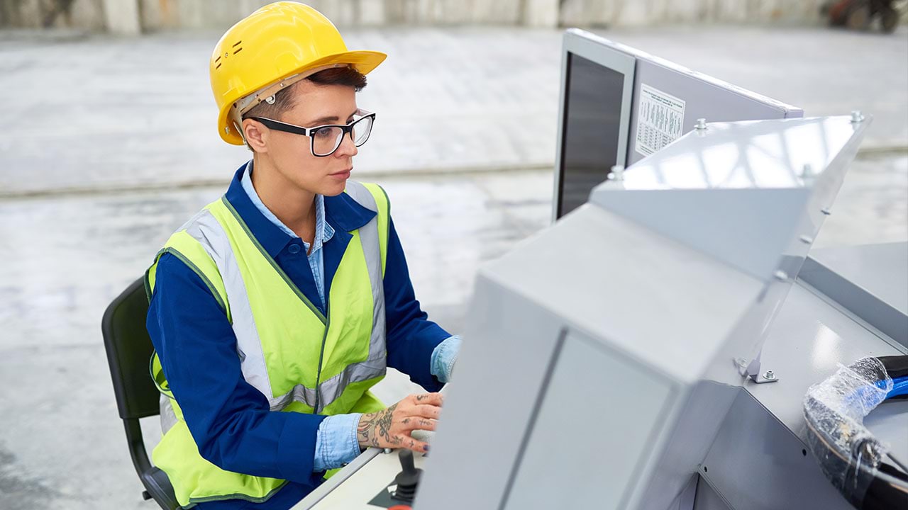 Person programing a machine