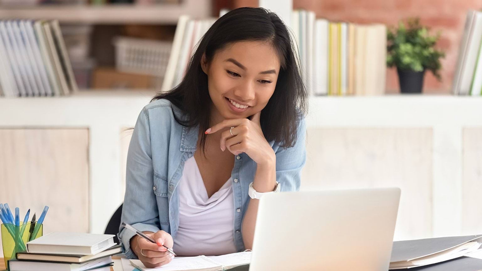 Get help with TAFE and training Person looking into a device