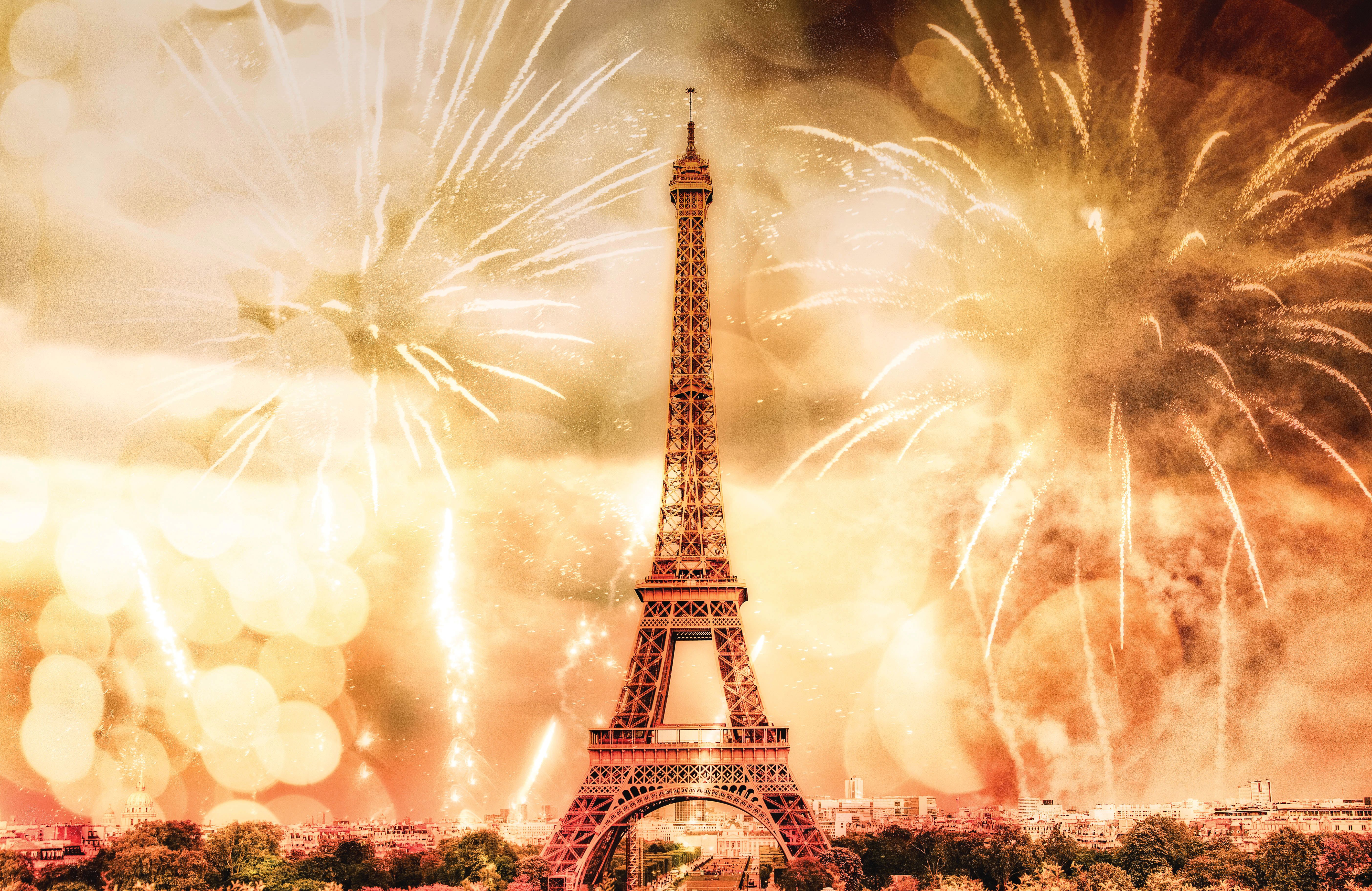 Eiffel Tower surrounded by fireworks