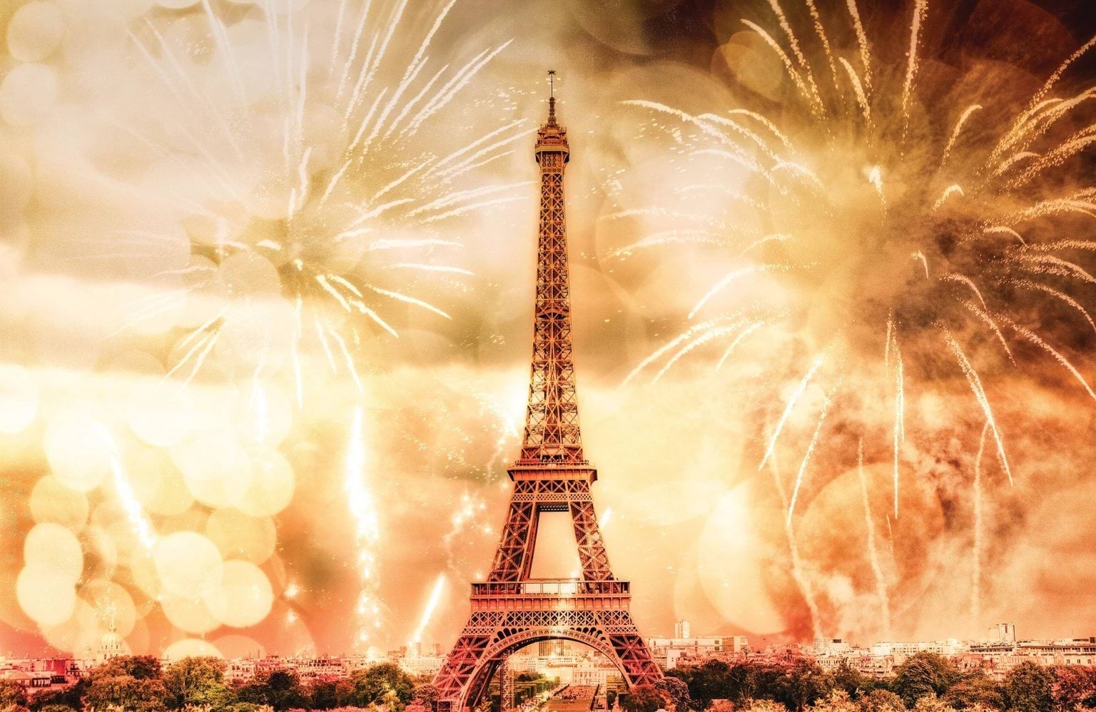 Eiffel Tower surrounded by fireworks
