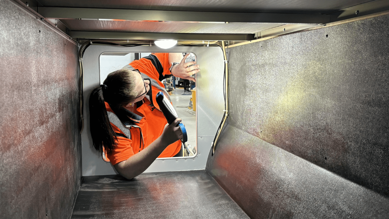 Women in Manufacturing - female Jayco emaployee inspecting caravan part