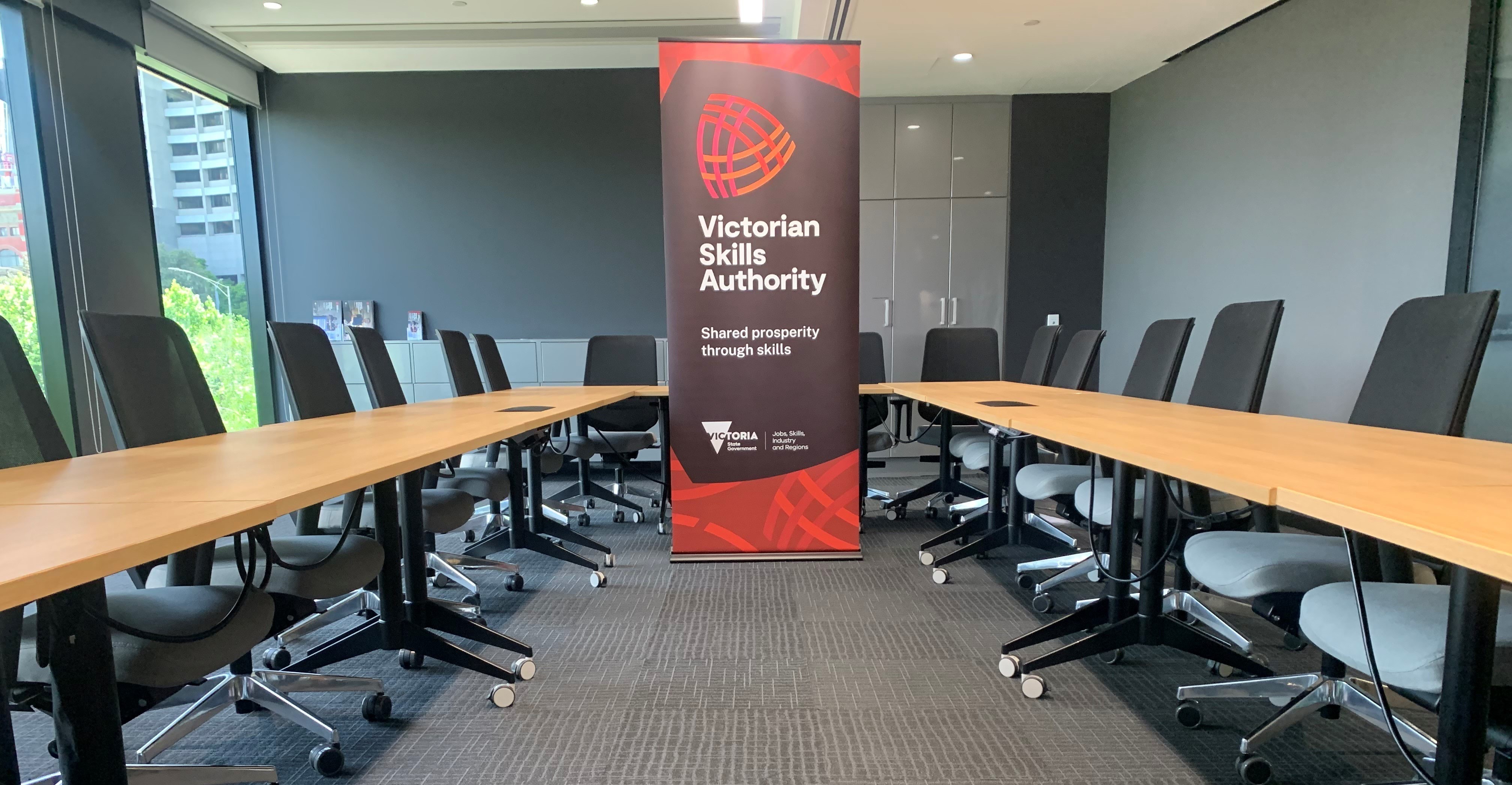 Empty boardroom with chairs and tables