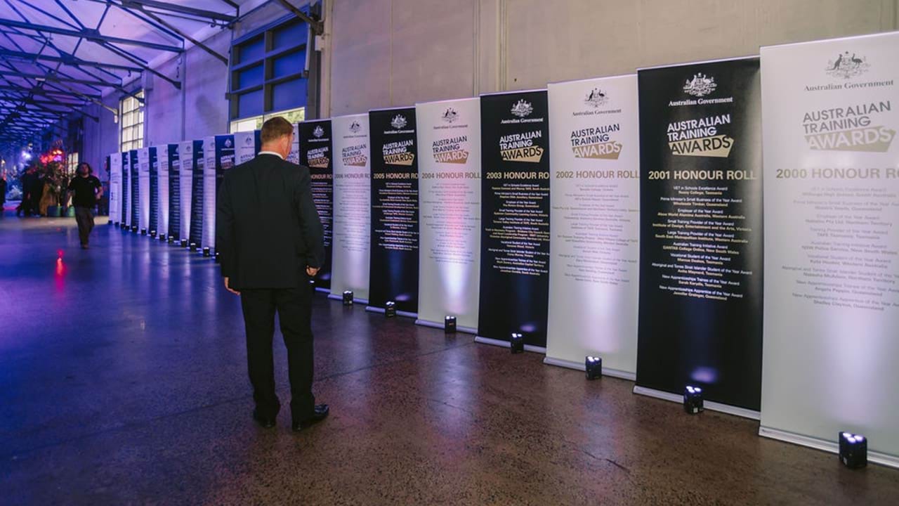 Australian Training Awards banners lined up in a hallway