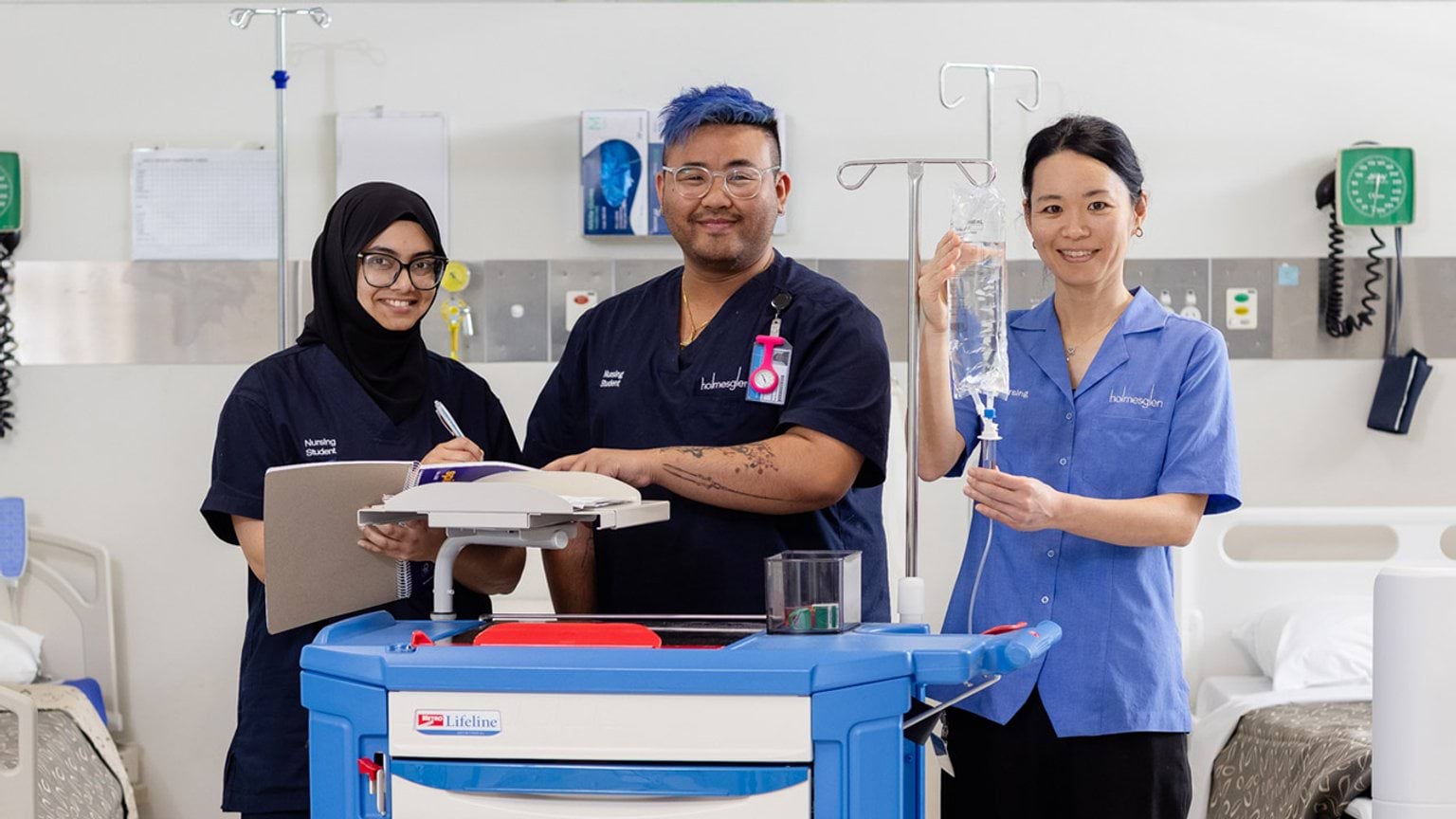 Victorian Skills Plan 2023 front cover Two female and one male nursing student in a practical class at TAFE