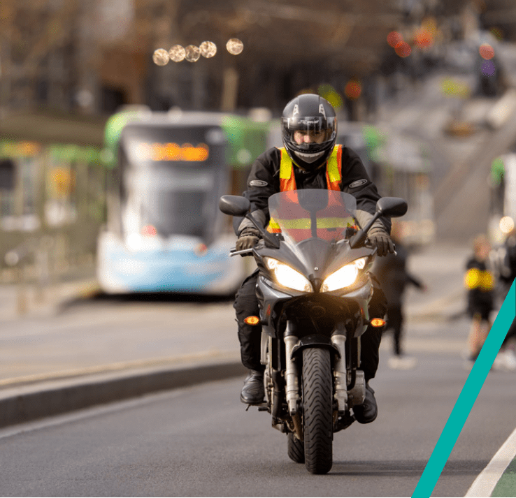 Image of motorcyclist riding on the road