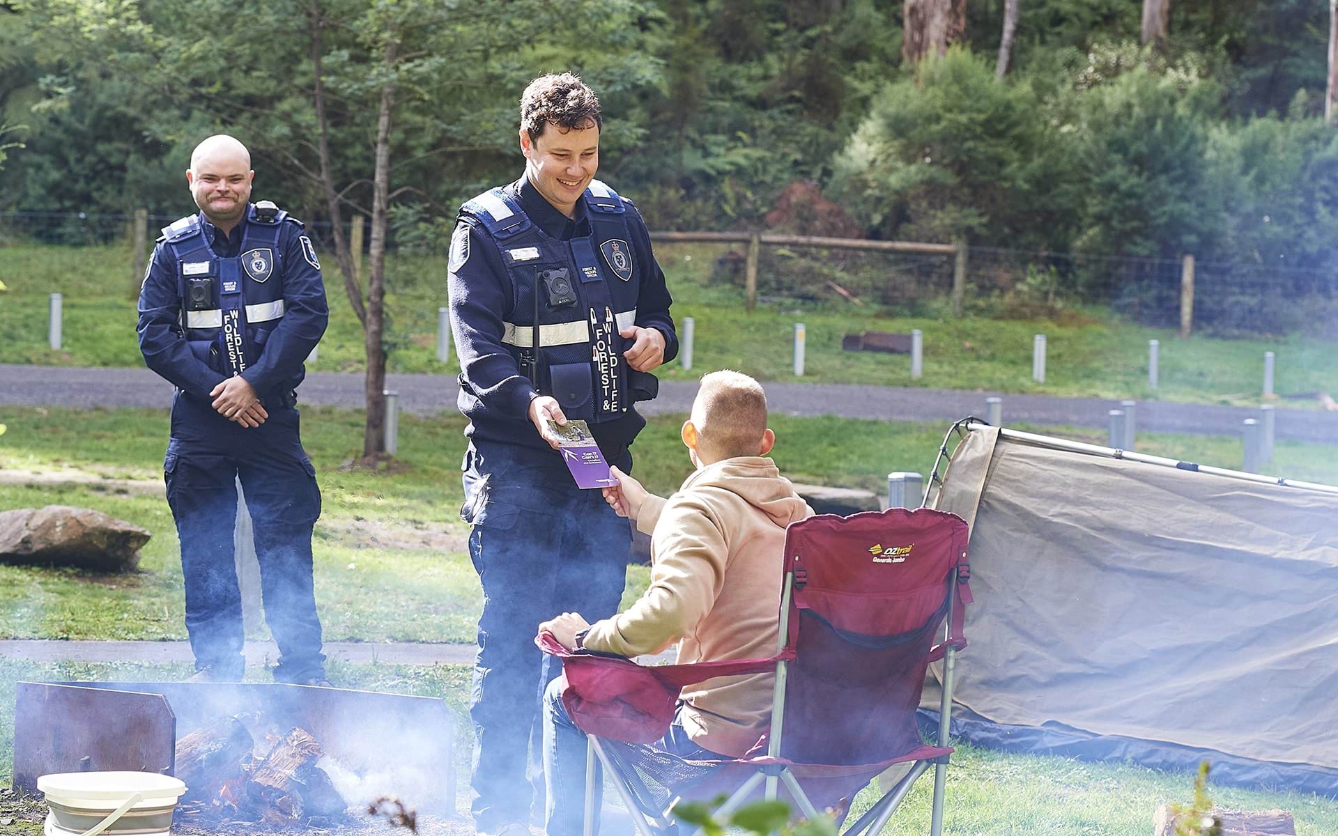 Authorised officers educating park visitors