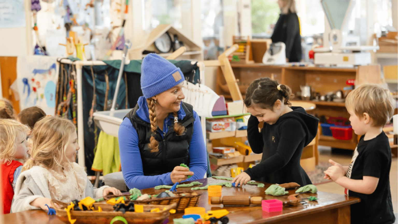 Kids are playing with a teacher