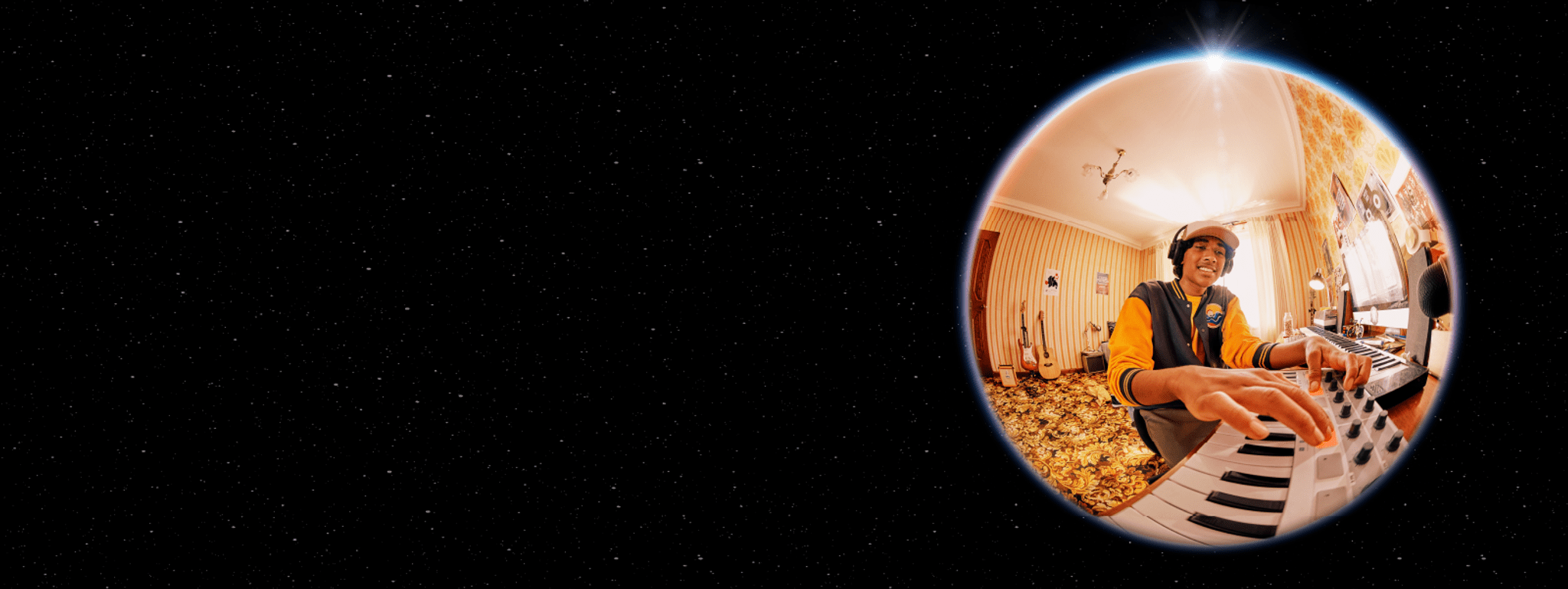 High school student using digital keyboard and DJ equipment.