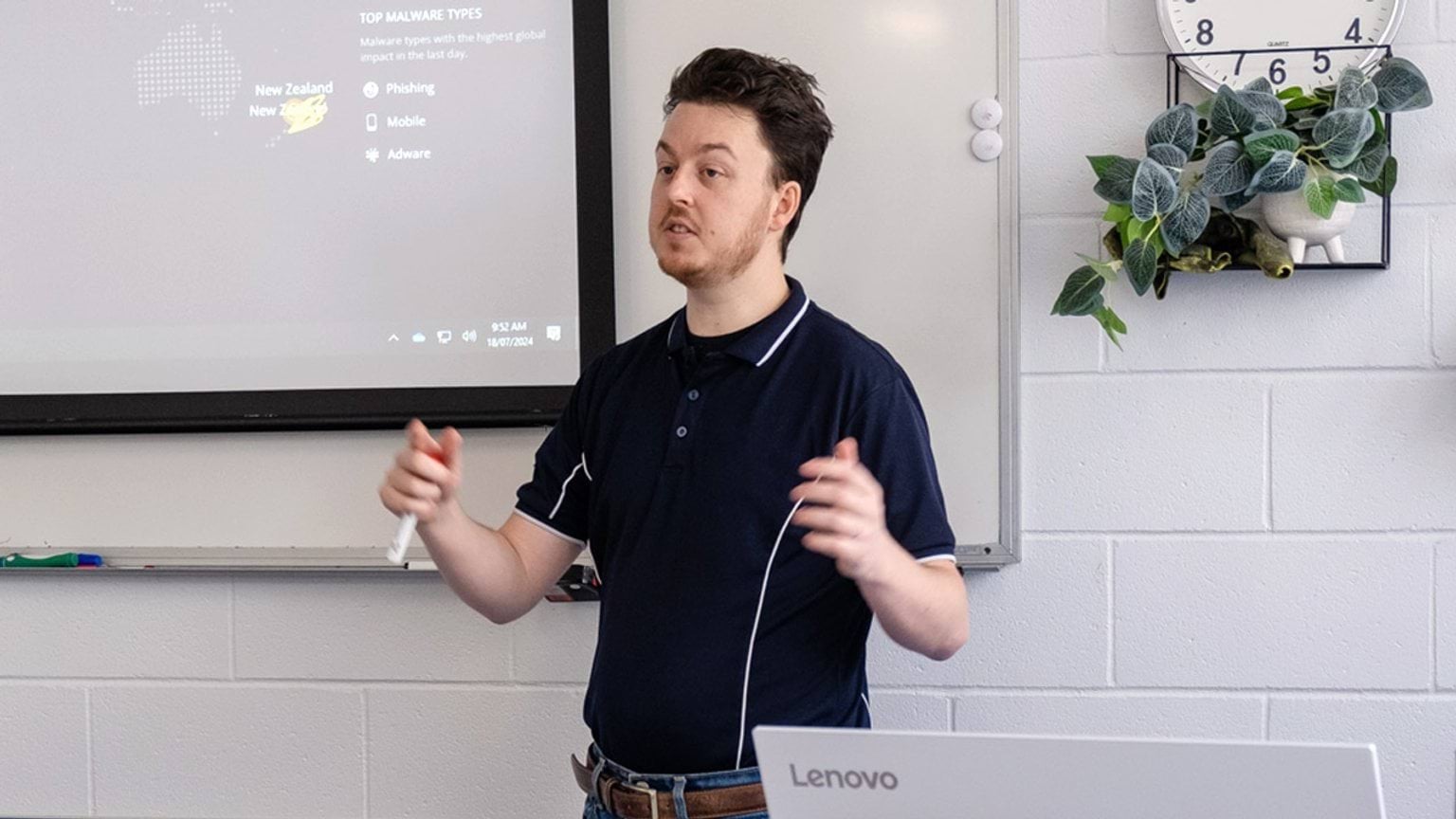 A TAFE technology teacher addressing the class